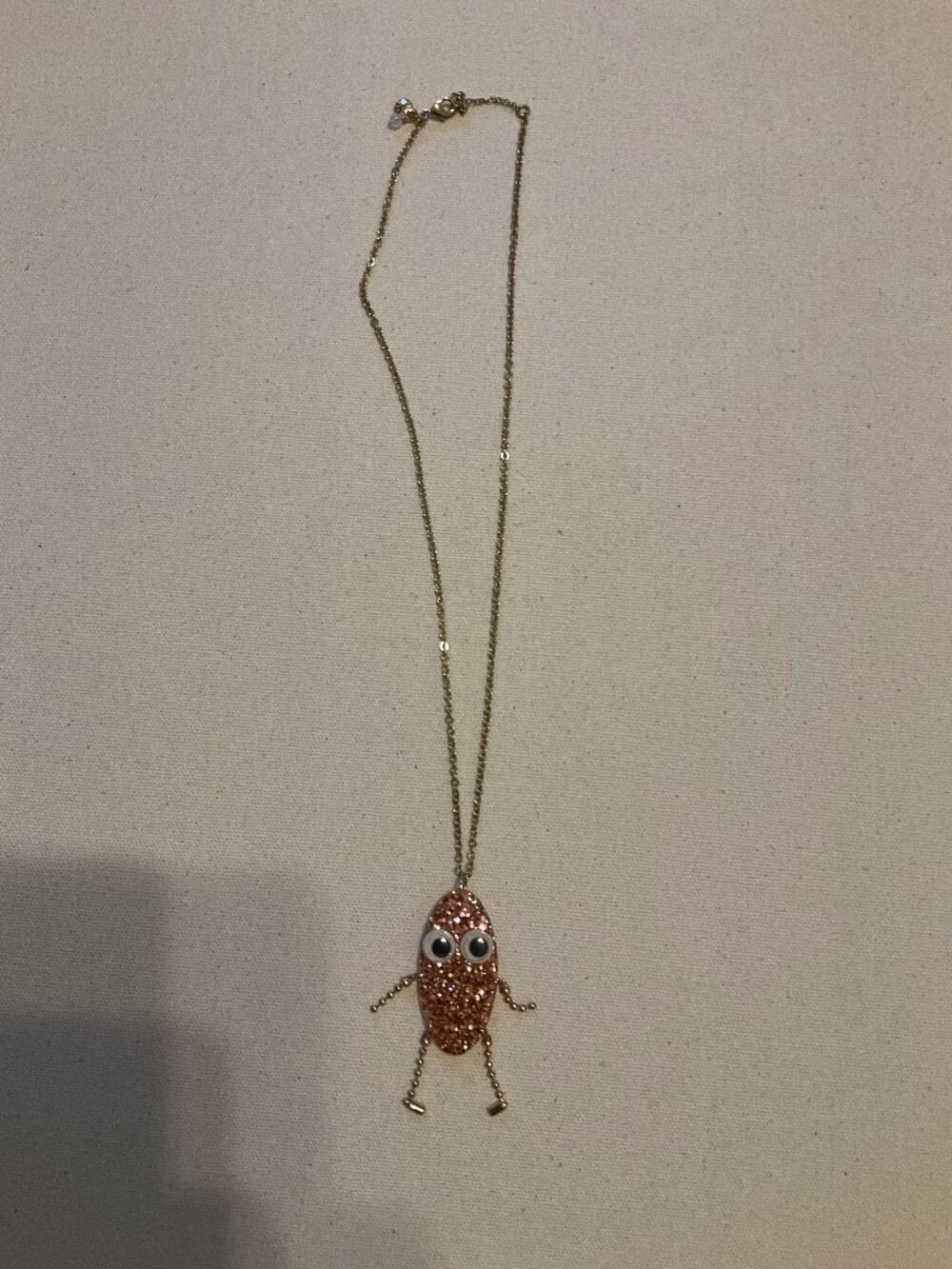 J.CREW CREWCUTS MONSTER WITH MOVING ARMS AND LEGS PENDANT NECKLACE. PINK SPARKLE